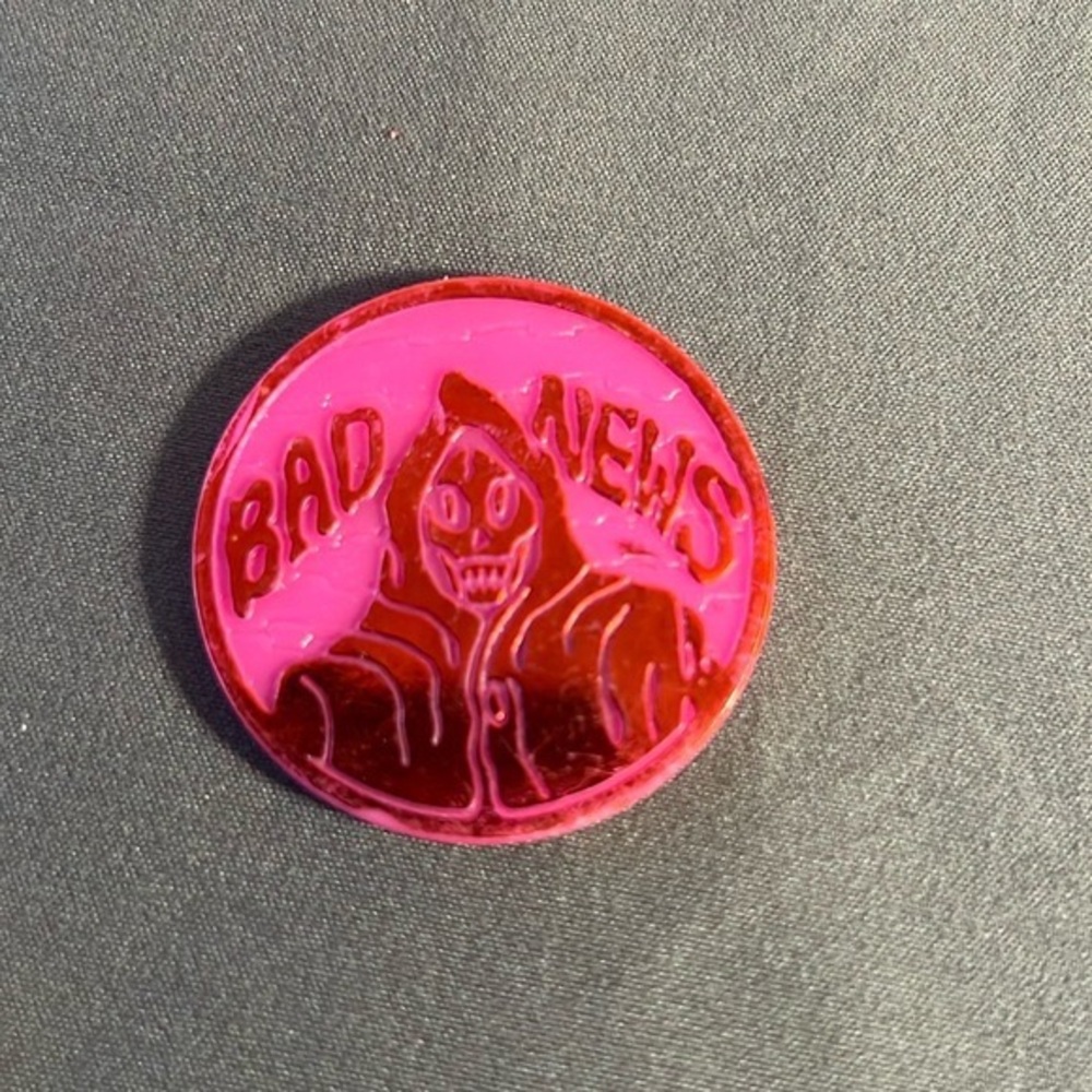 Pink and Red 'Bad News' Pin